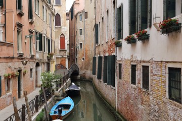 colorful houses and canal in Venice, Italy