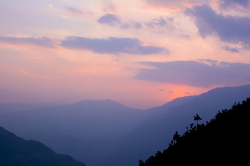 Beautiful colorful sunset in Himalayan mountains, Nepal. View from Sete - small village on the way from Jiri to Everest basecamp.