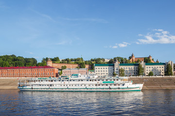 Fototapeta na wymiar Embankment, three-deck motor ship near the pier in Nizhny Novgorod