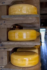 Deurstickers Wheels of cheese © Patricia