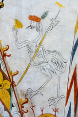 Fantasy bird with an human head and an halberd, medieval wall-painting