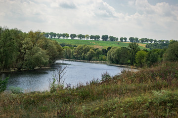 Fototapeta premium Summer sunny river landscape. Concept travel, travel.