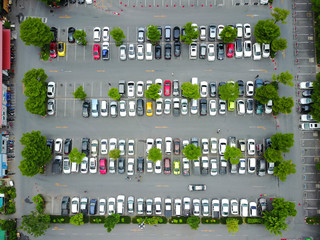 Aerial view from the drone on the car parking lot