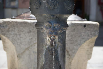 Traditional drinking water fountain in Venice, Italy