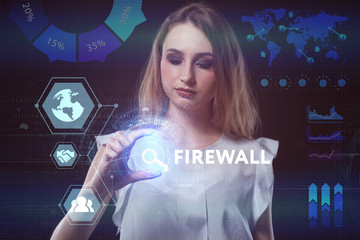 The concept of business, technology, the Internet and the network. A young entrepreneur working on a virtual screen of the future and sees the inscription: Firewall