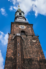 Fototapeta na wymiar St. Peter's Church (St. Petri Kirke, 15th century) is a historic church being oldest preserved church in city of Copenhagen, domicile of German-speaking congregation. Denmark.