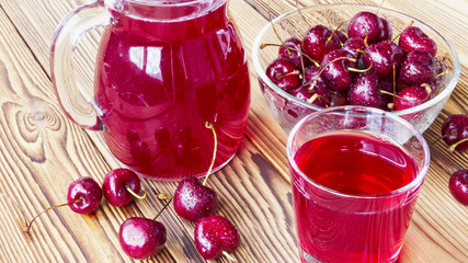 cherry juice in a glass and decanter