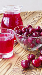 cherry juice in a glass and decanter