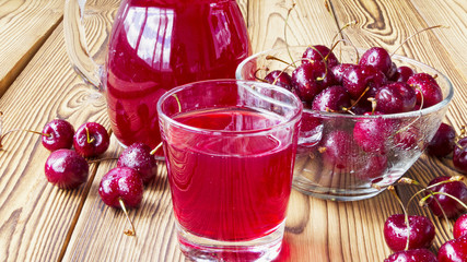 cherry juice in a glass and decanter