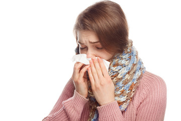Woman blowing her nose