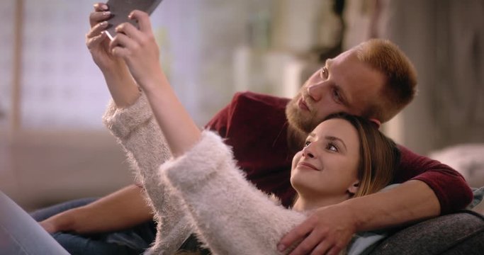 Funny couple poses for a selfie