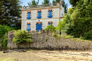 Old traditional house with garden in bretagne, France