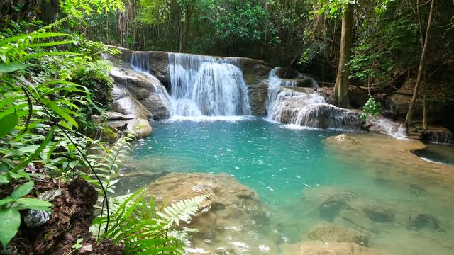 Dolly shot of deep forest waterfall, Kanchanaburi, Thailand