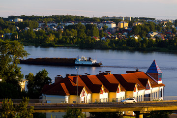 Summer city landscape with a river