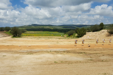 Outdoor shooting range, IDF army soldiers training zone, targets, nature background, Middle East, Israel