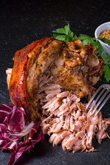 fresh roasted knuckle of pork with mustard