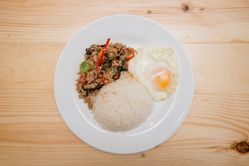stir-fried pork and basil and fried egg with rice, Thai food