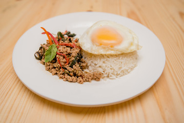 stir-fried pork and basil and fried egg with rice, Thai food