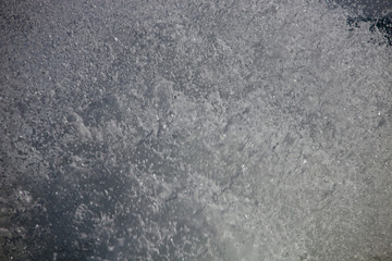Spray and foam of the waves of the sea water