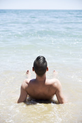 young man on the beach