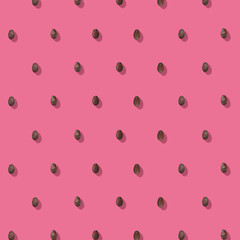Watermelon seeds pink pattern. Flat lay. Summer concept.