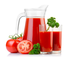 Jug and glass with tomato juice and fresh fruits isolated on white