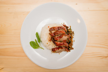 stir-fried roasted duck and basil and fried egg with rice, Thai food