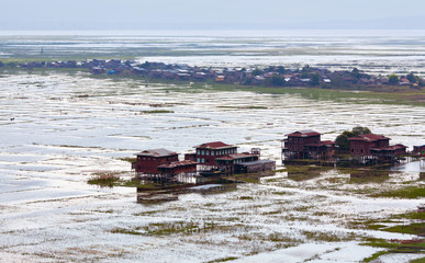 Village and fields over water on Inle lake, Shan state, Myanmar