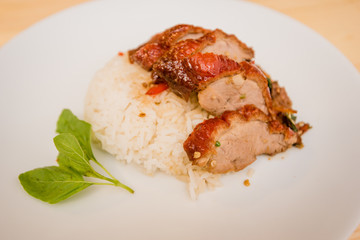 stir-fried roasted duck and basil and fried egg with rice, Thai food