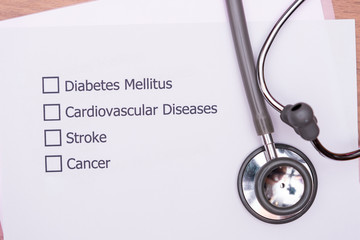 Diagnosis form placed on the doctor's desk. Chronic diseases, the major cause of disability and...