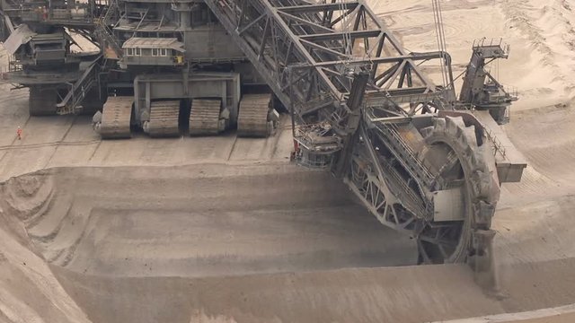 Bucket-wheel excavator mining in a brown coal open pit mine. 