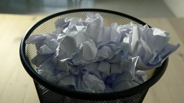 Throw crumpled into the trash.