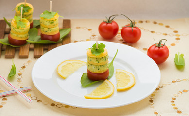 Appetizer. Canapes of cheese, cream cheese with garlic, parsley, basil, sorrel and cherry tomatoes