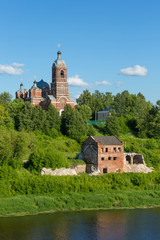 The ruins of an abandoned building and Transfiguration cathedral in Kovrov, Vladimir region, Russia