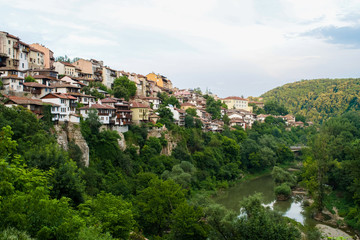 Fototapeta na wymiar Houses along the hillside of Veliko Tarnovo Old Town, Bulgaria
