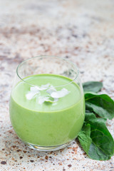 Vanilla, mint, spinach and coconut milk detox green smoothie, vertical, copy space