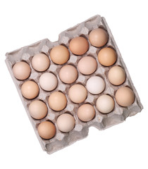 Brown eggs in an egg box, high angle view.