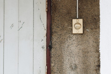 Old electronic bell on front door