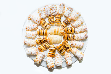 traditional austrian cream pastry table top - schaumrolle, kremrole, shillerlocke