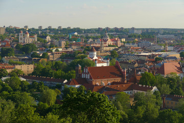 Fototapeta na wymiar Panorama of the city of Vilnius with many monuments, churches, castles and greenery. City listed as a UNESCO World Heritage site.