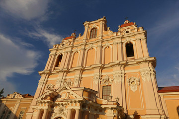 Baroque church on the background of the blue sky in Vilnius.