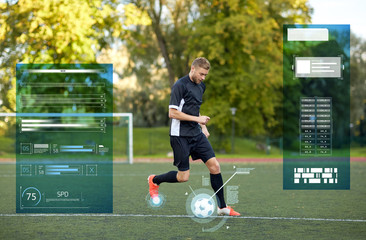 soccer player playing with ball on football field