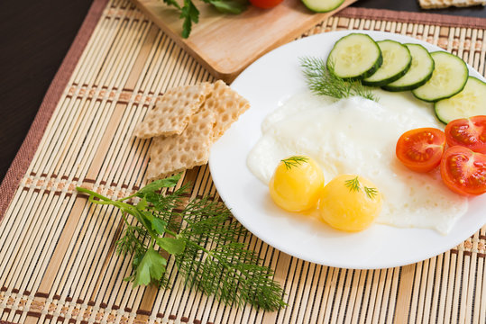 Breakfast. Fried Eggs (with raw frozen yolk) and Vegetables