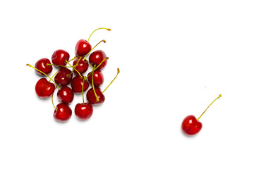 Naklejka na ściany i meble Sweet wild red cherries on white background