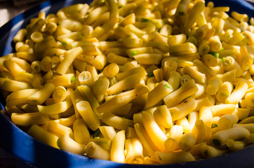 freshly peeled grown puppet. summer vegetables. healthy vegetables in kitchen