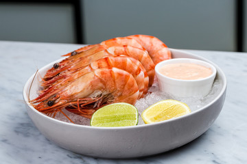 Fresh royal prawns with lemon and sauce