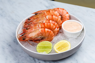 Fresh royal prawns with lemon and sauce