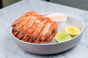 Fresh royal prawns with lemon and sauce
