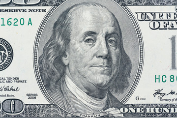 Macro shot : president Franklin on the one hundred dollar bill. - Concept of financial.