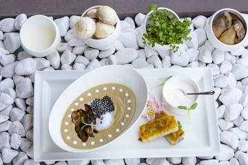 Cream soup with white mushrooms. Cream soup in interior design